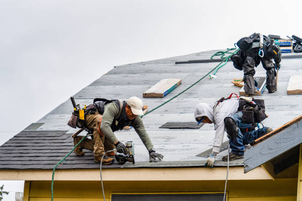 Professional Gutter Installation technician working in Manchester, IA